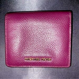 Michael Kors purple pebbled leather wallet